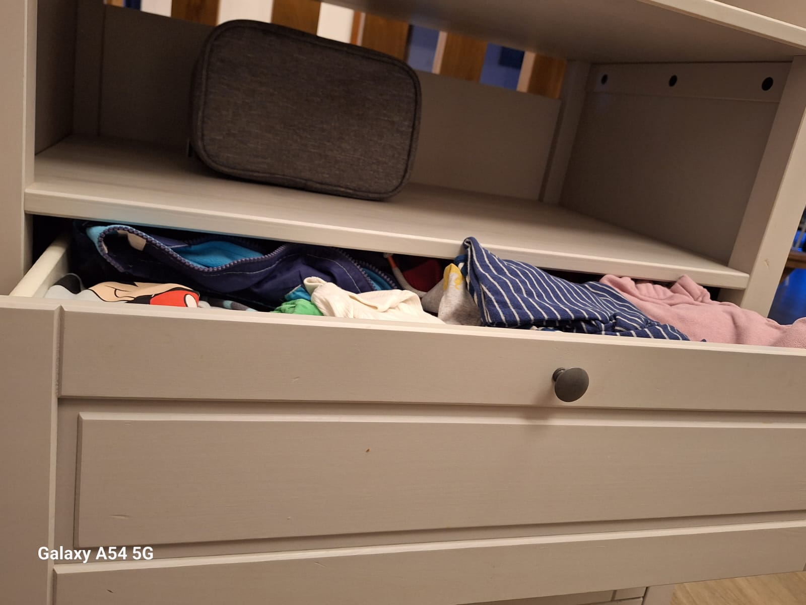 Newborn Baby Clothes in a dresser
